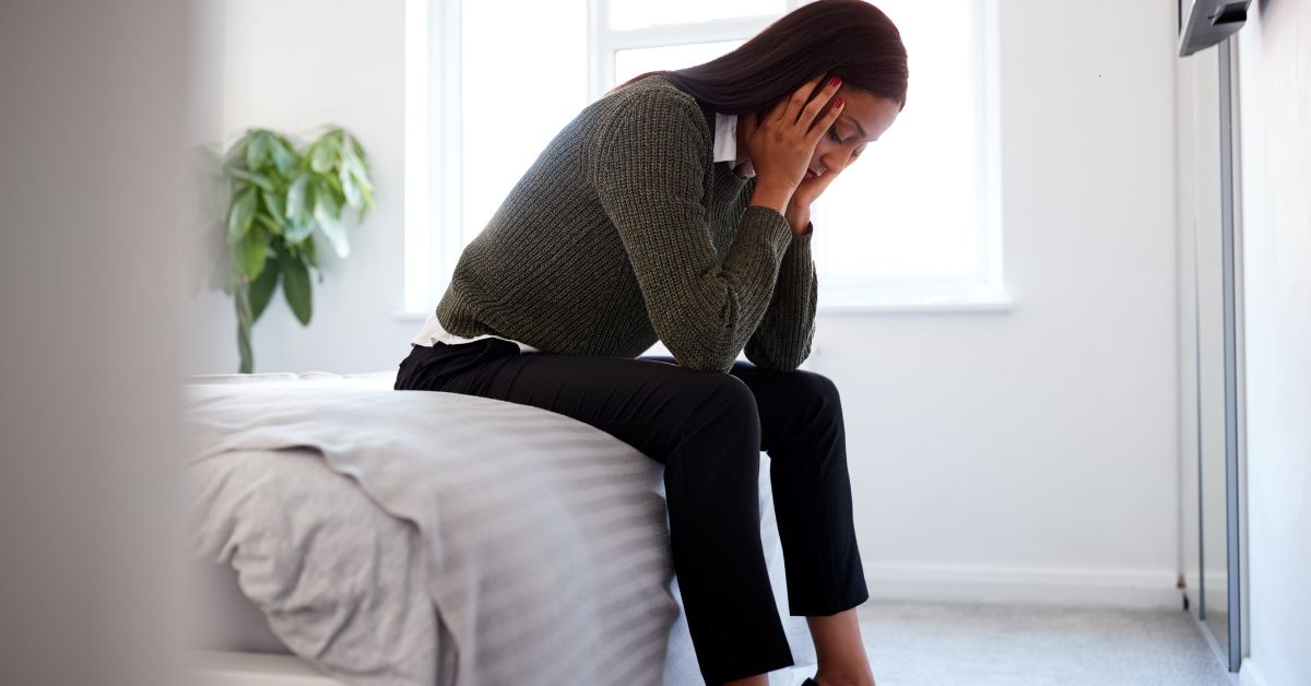 Pelvic floor physiotherapist explaining treatment for painful intercourse (dyspareunia).